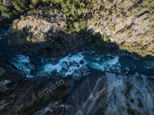Preview: Aerial View of River flowing in canyon. Nature Background