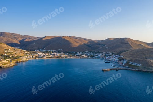Preview: Kea Tzia island, Cyclades, Greece. Aerial drone photo of the port at sunset time.