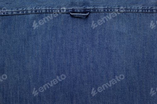 Preview: Blue jeans denim background texture. Jeans fabric material surface