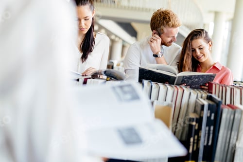 Preview: Group of students studying in library
