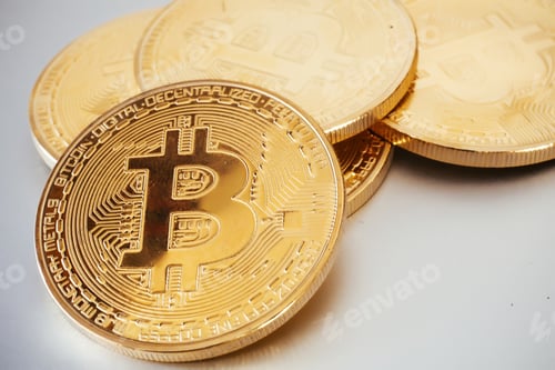 Preview: Golden bitcoins on white background