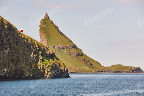 Preview: Faroe islands sunset dramatic coastline landscape in Vagar island. Seascape