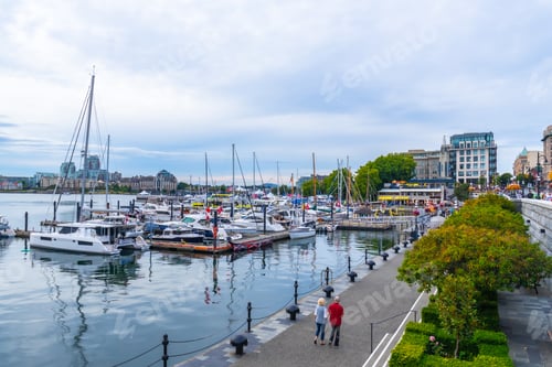 Preview: Tourists walking near marina in victoria, british columbia