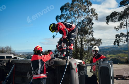 Preview: Firefighters rescuing a victim from a car during an accident