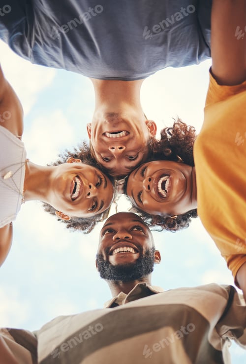 Preview: Friends, travel and freedom of happy people showing trust, smile and support in huddle below nature