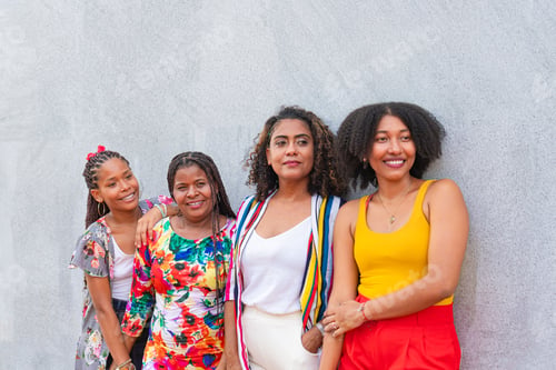 Preview: Friends share a joyful moment against a gray backdrop