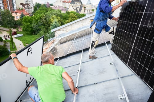 Preview: Workers building solar panel system on roof of house. Men installing photovoltaic solar module