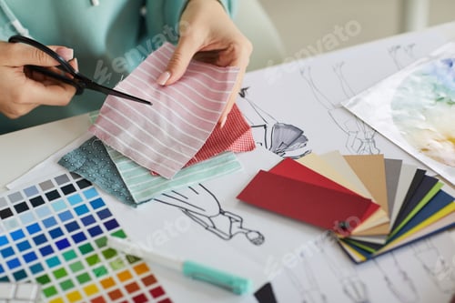 Preview: Cutting fabric in tailors studio