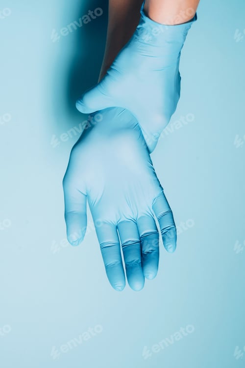 Preview: Hand Protected by Blue Latex Medical Glove