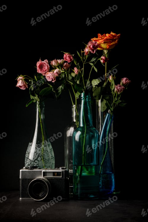 Preview: Retro camera near beautiful flowers