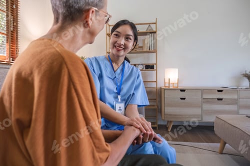 Preview: Asian woman or nurse cares for the shoulders of a senior grandmother in her 60s, providing
