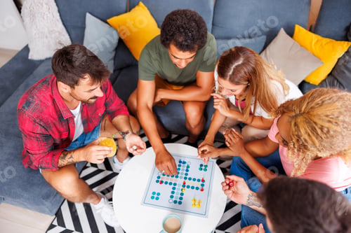 Preview: Friends having fun playing ludo board game