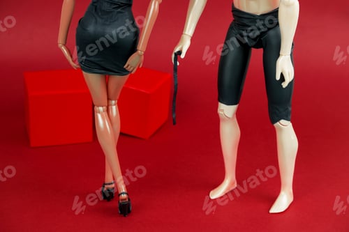 Stylish Figures Against a Red Background