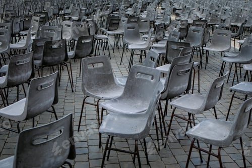 Preview: Lots of plastic chairs in this square