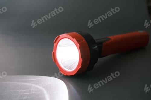 Preview: a tourch light on a black background,