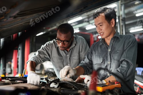 Preview: Car Mechanics Checking Engine