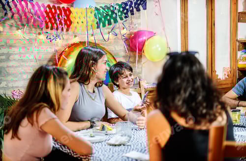 Preview: Happy family celebrating birthday at home
