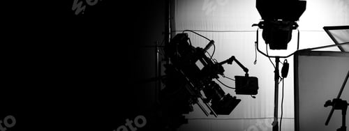 Preview: Behind video camera in film or movie production on tripod