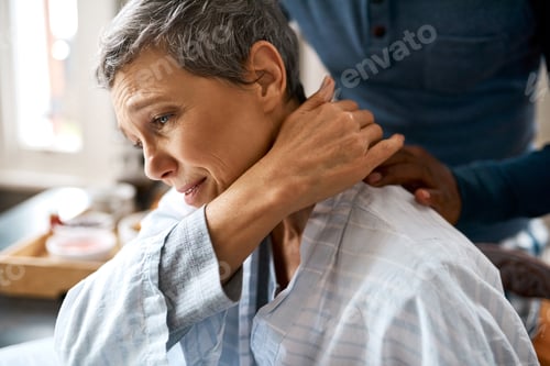 Preview: Always there for each other. Shot of an unrecognizable husband consoling his wife at home.