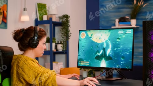 Preview: Gamer woman with headphones playing space shooter video game