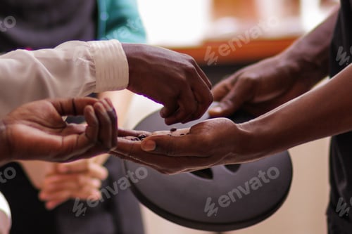 Preview: Hands closeup sharing smashed coffee