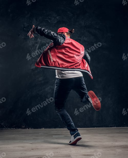 Preview: Stylish guy performs breakdance acrobatic elements.