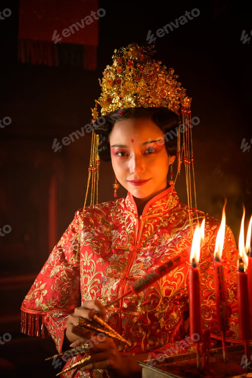 Preview: Chinese woman make wishes, pray, and light candles.