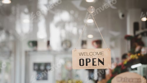 Preview: Open sign board through the door glass.