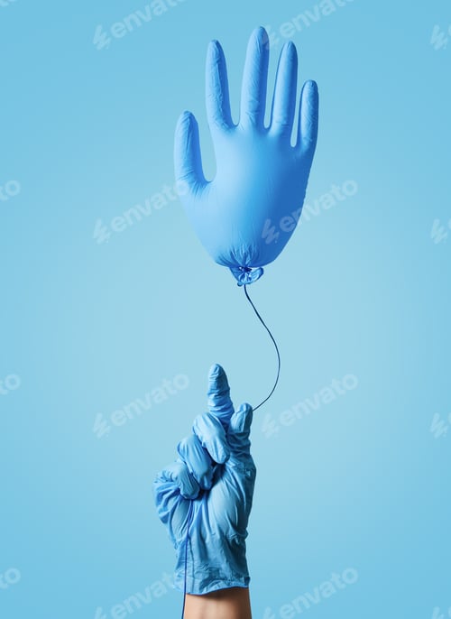 Preview: Cleaning concept.Concept of medicine.A hand in a blue glove holds an inflatable ball.Spring cleaning