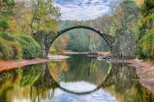 Preview: Fabulous autumn landscape in Azalea and Rhododendron Park Kromlau. Rakotz Bridge