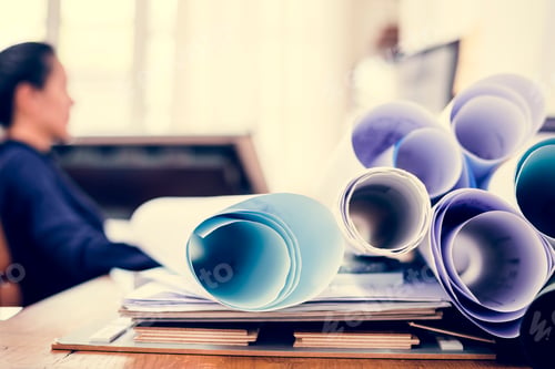 Preview: Businesswoman working in office and a document