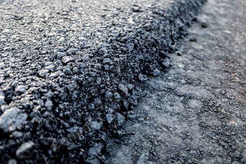 Preview: Asphalt layer just spread on a new road, detail