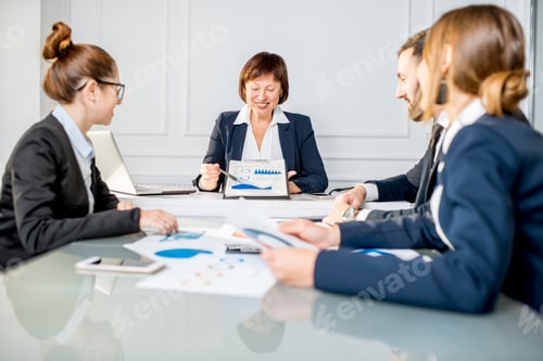 Preview: Business people during the conference in the office