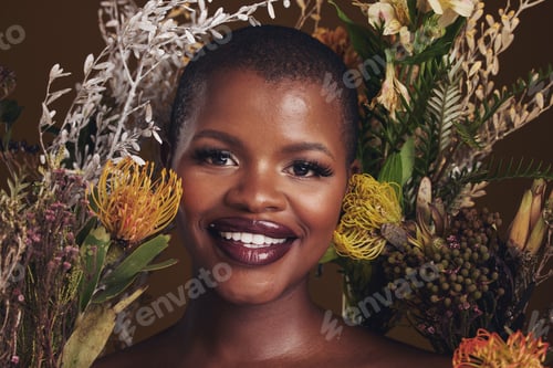 Preview: African woman, flowers and makeup in studio portrait with beauty, wellness or natural glow by brown
