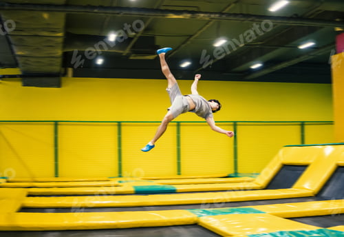 Preview: trampoline jumper performs acrobatic exercises on the trampoline