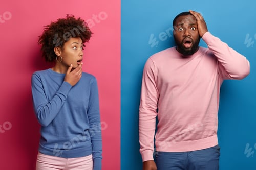 Preview: Extremly excited and amazed ethnic woman and man shocked by bad sudden news, keep jaws dropped, star