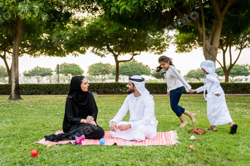 Preview: Happy arabian family in a park