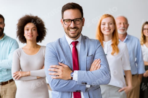 Preview: Line of happy and positive business people standing in the office