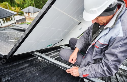 Preview: Male worker securing cables by special tie.