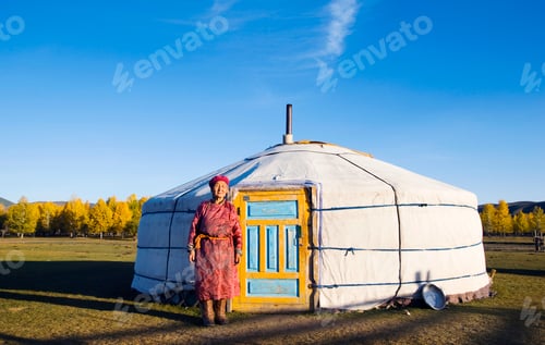 Preview: Mongolian lady standing in front of a tent