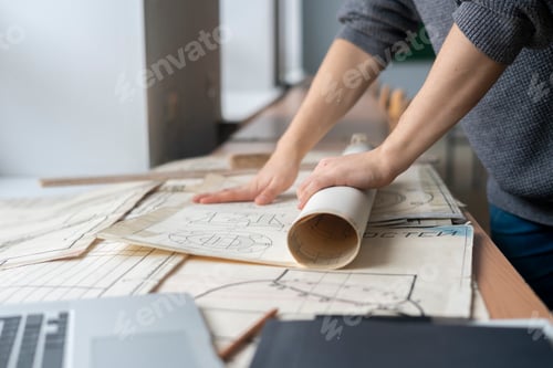 Preview: persosn hand roll paper scheme or drawing b