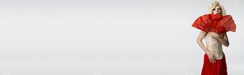 Preview: Glamourous drag queen poses with fan