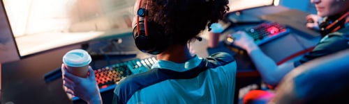 Preview: Woman esports gamer performing in gaming tournament in cyber club