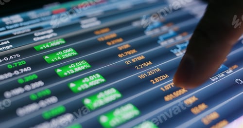 Preview: Finger touch on the tablet with stock market data