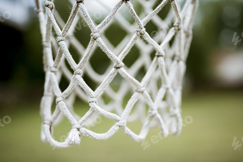 Preview: Close shot of a basketball hoop net with a blurred background