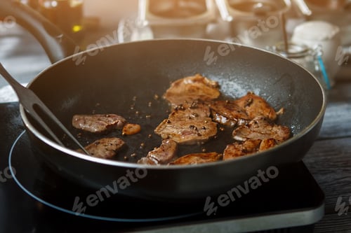 Preview: Pieces of meat on pan