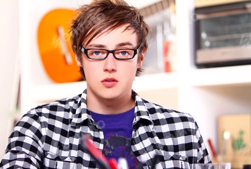 Preview: Young student studying at home