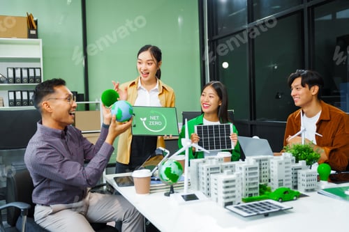 Preview: Colleagues meet at desk brainstorm environmental management strategies. discuss carbon emissions