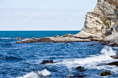 Preview: Blue sea water, stones and rocks on Adriatic sea coast.