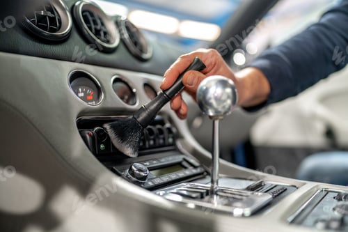 Preview: cleaning the interior of a luxury car with a brush